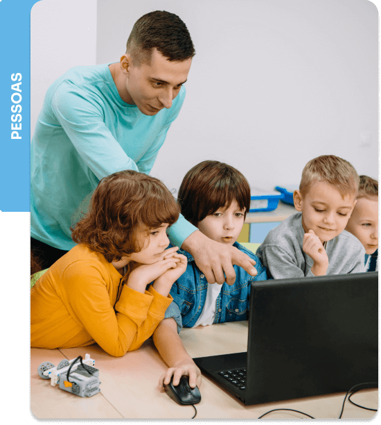 A palavra pessoas seguida de uma imagem de um professor apontando para um computador rodeado de 4 crianças olhando para sua tela